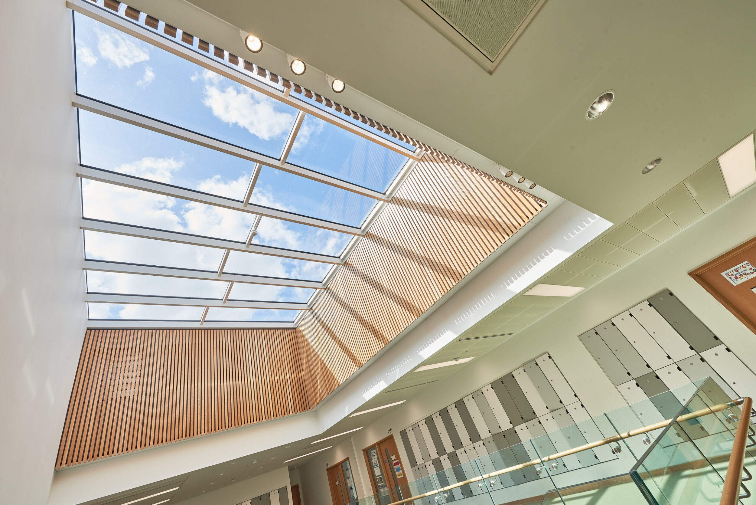 Glass roof at Dame Alice Owen School for natural light in a educational environment